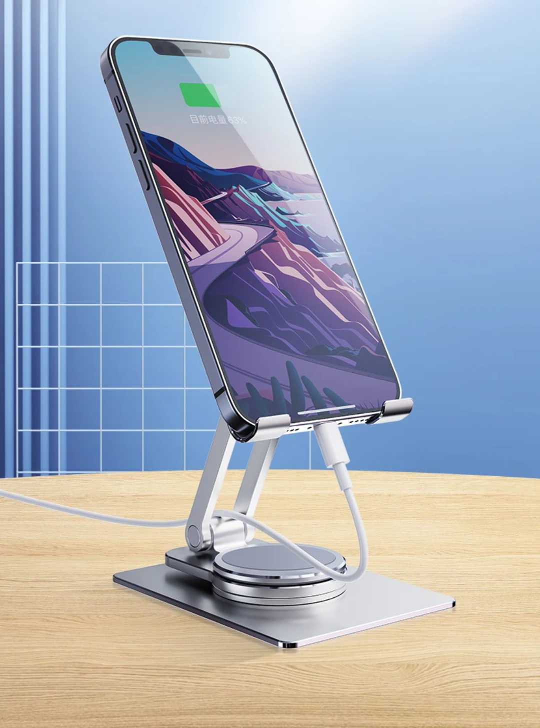 Support de téléphone en métal argenté élégant et fonctionnel.